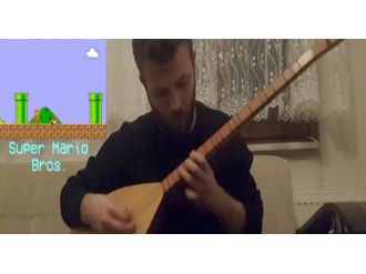 Atari müziklerini bağlama ile çaldı