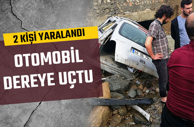 OTOMOBİL DEREYE UÇTU: 2 KİŞİ YARALANDI