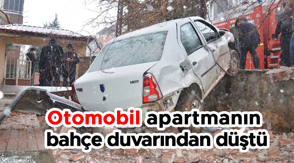 Otomobil apartmanın bahçe duvarından düştü