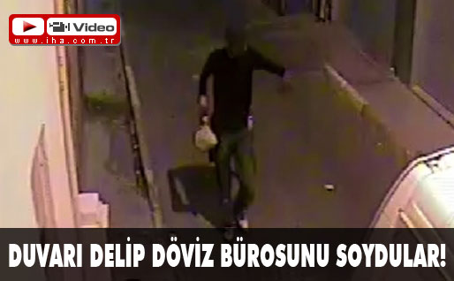 Duvarı delip döviz bürosunu soydular!